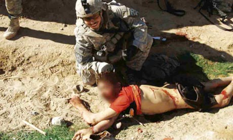 Photos show US soldiers in Afghanistan posing with dead civilians