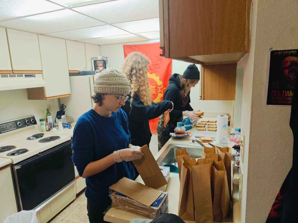 Service to the People: Caring for neighbors, united in class struggle