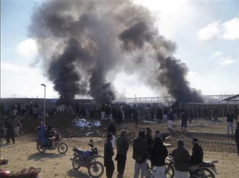 Afghanistan demands NATO put Koran-burners on trial