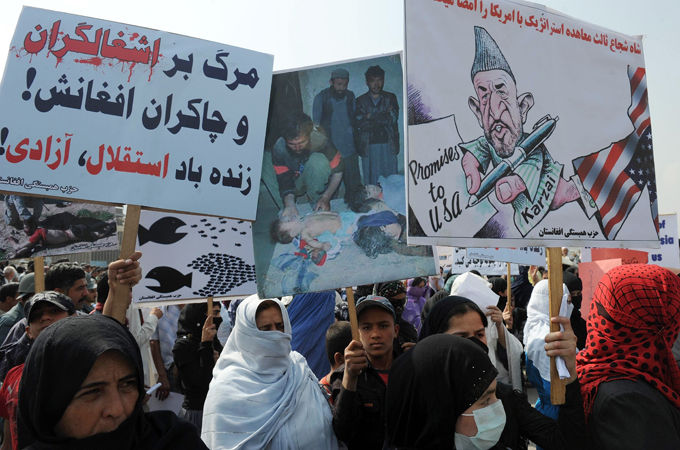 Afghans protest in run-up to war anniversary
