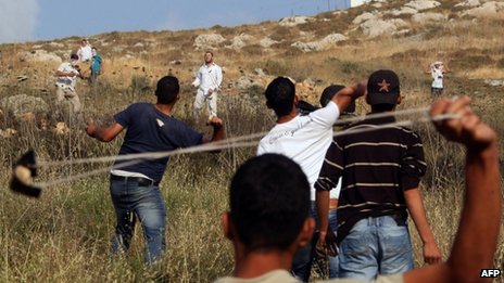 Settlers filmed shooting at Palestinian protesters‎