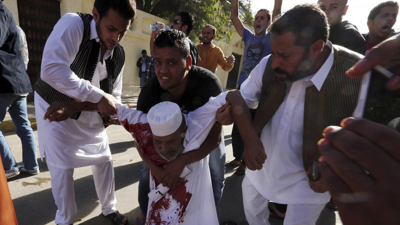 Clashes between residents and militia leave dozens dead, hundreds injured in Libyan capital