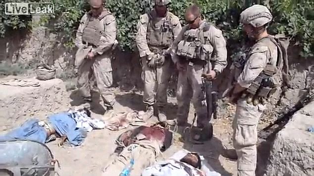 Marine Corps probe after video emerges showing American troops ‘urinating on dead Afghan bodies’
