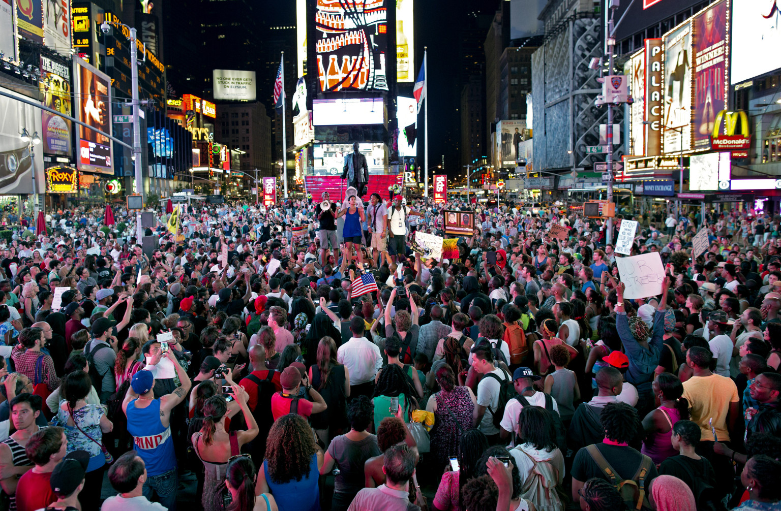 Thousands protest Zimmerman verdict as DoJ vows to restart hate crime inquiry
