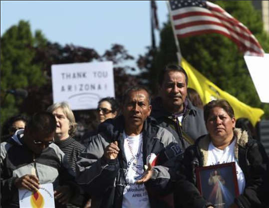 Hundreds march in Phoenix against Arizona immigration law
