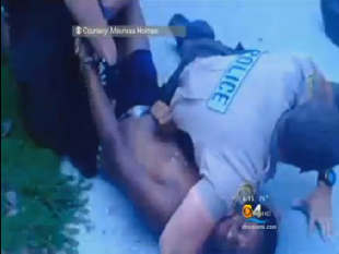 Black 14-year-old Carrying a Puppy Tackled and Choked by Police for Giving Them a “Dehumanizing Stare”