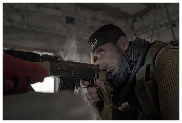 ‘Whole families murdered’: Syrian rebels execute over 80 civilians outside Damascus