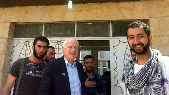 U.S. senator McCain pictured with Syrian rebel kidnapper